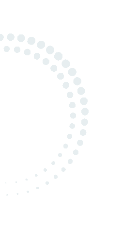 A series of light gray dots form a semi-circular, fading pattern on a plain light background.